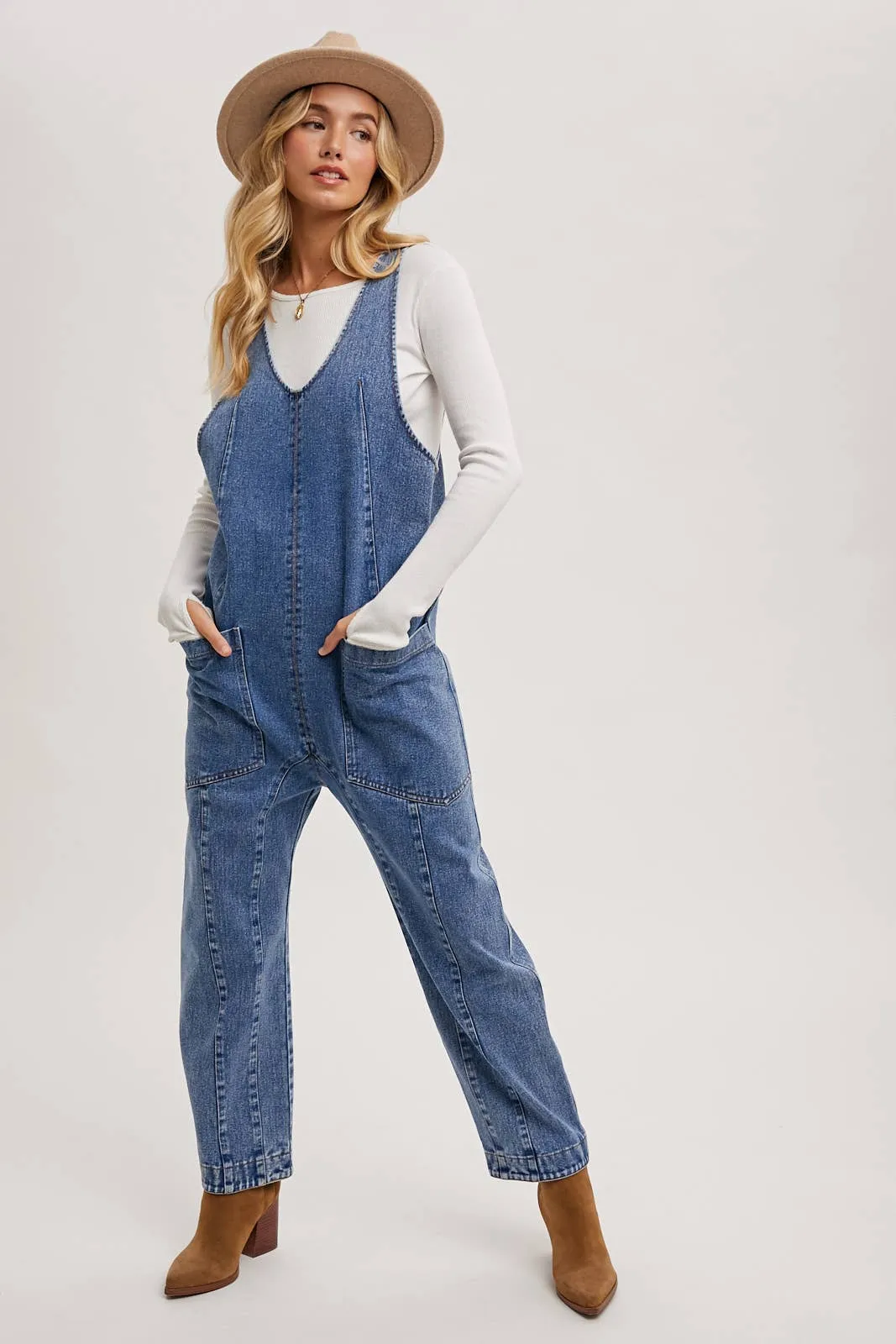 DENIM JUMPSUIT OVERALL IN A RELAXED FIT WITH HAREM LEGS