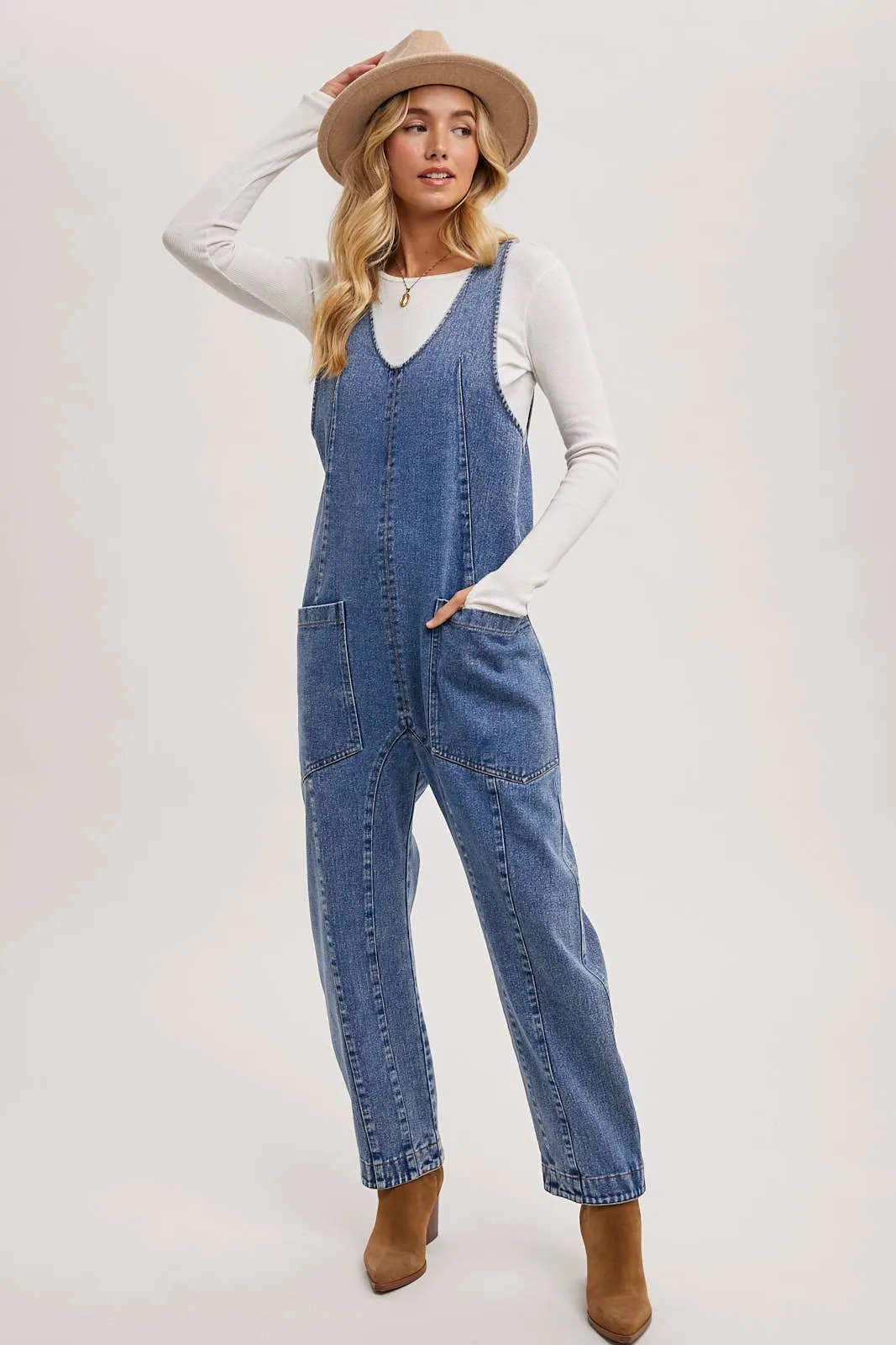 DENIM JUMPSUIT OVERALL IN A RELAXED FIT WITH HAREM LEGS