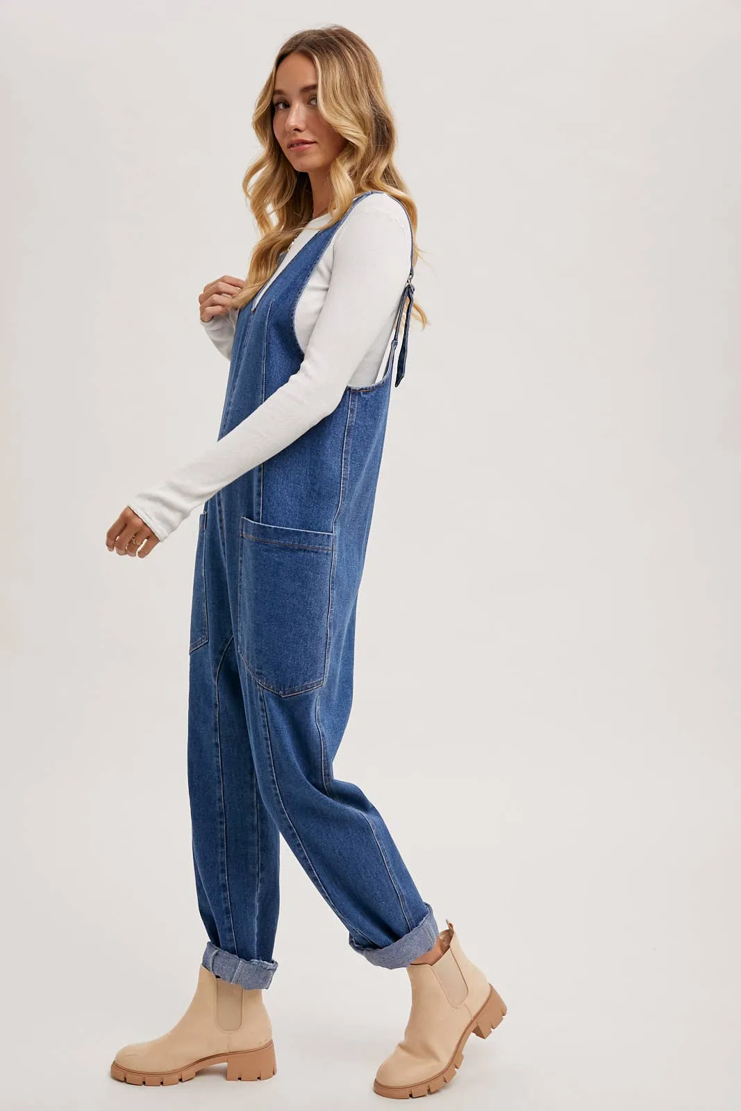 DENIM JUMPSUIT OVERALL IN A RELAXED FIT WITH HAREM LEGS