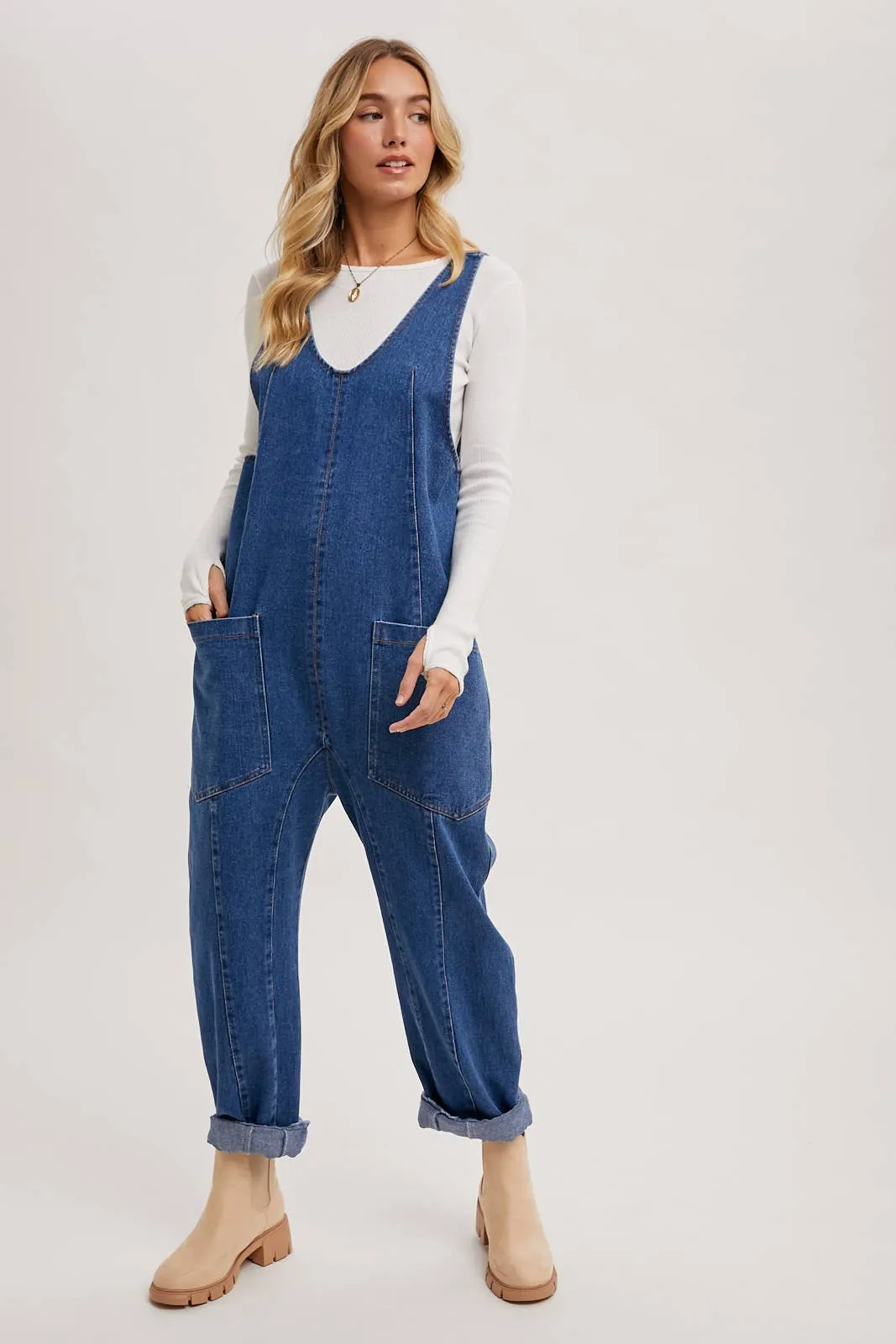 DENIM JUMPSUIT OVERALL IN A RELAXED FIT WITH HAREM LEGS