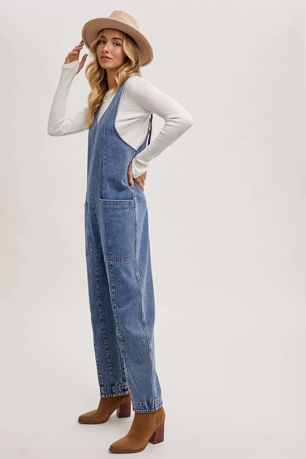 DENIM JUMPSUIT OVERALL IN A RELAXED FIT WITH HAREM LEGS