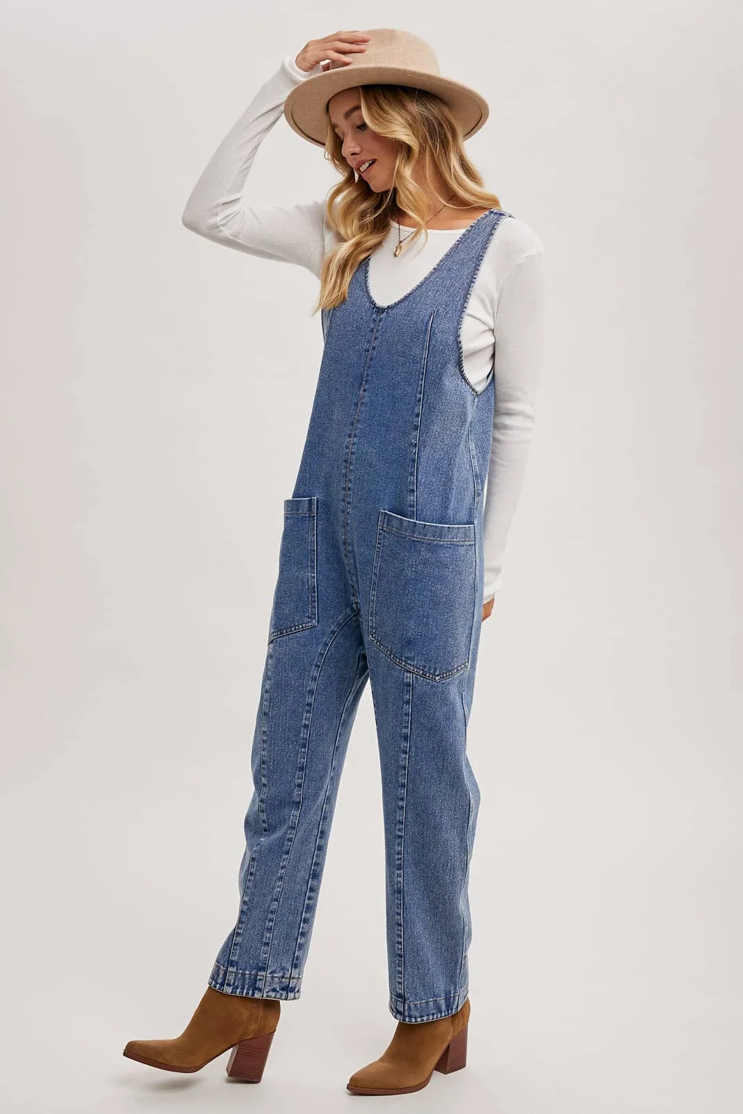 DENIM JUMPSUIT OVERALL IN A RELAXED FIT WITH HAREM LEGS