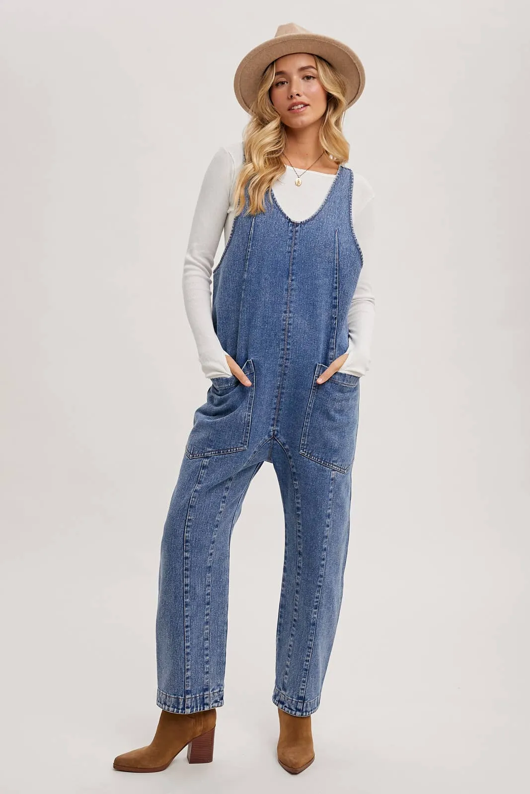 DENIM JUMPSUIT OVERALL IN A RELAXED FIT WITH HAREM LEGS