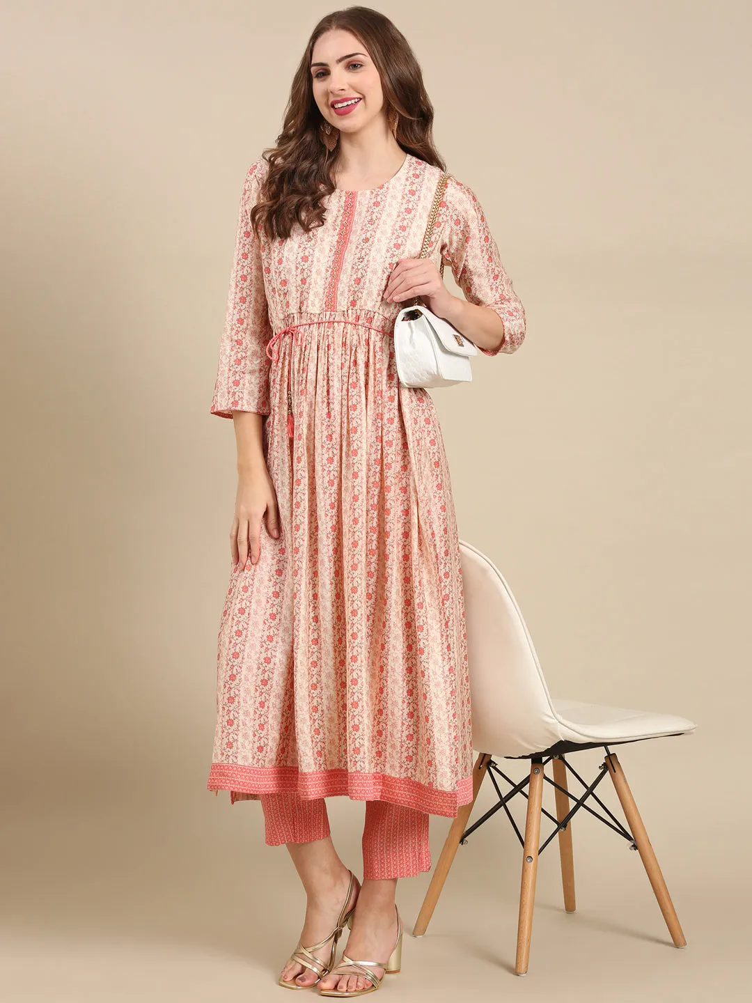Women Cream Floral Printed Empire Beads and Stones Kurta Set
